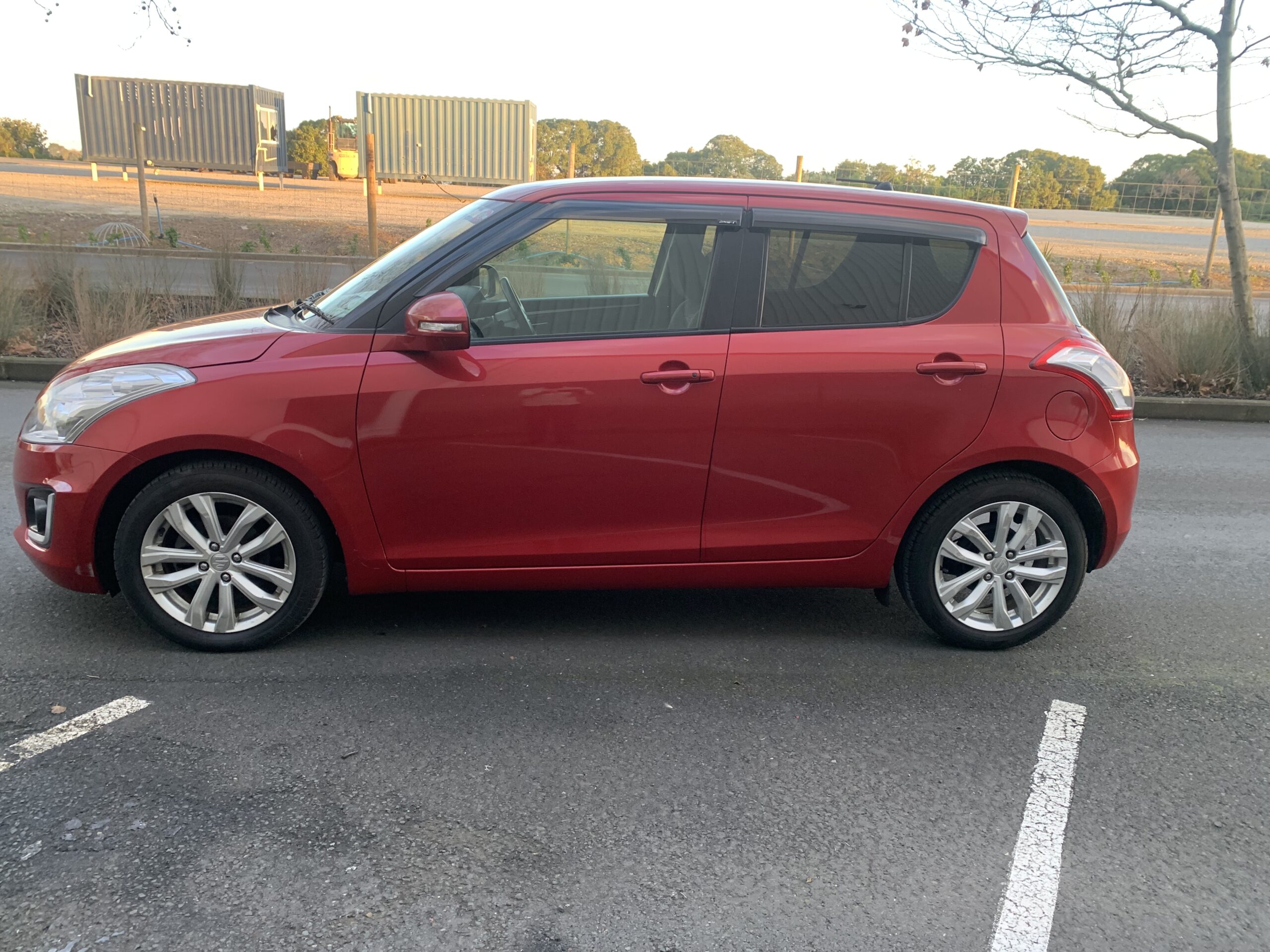 Suzuki Swift 2014: RED – KM 85,601